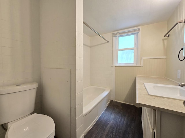6321 W Keefe Avenue Parkway Unit 6323, Milwaukee, WI 53216 - bathroom with toilet, wood finished floors, vanity, shower / bath combination, and wainscoting