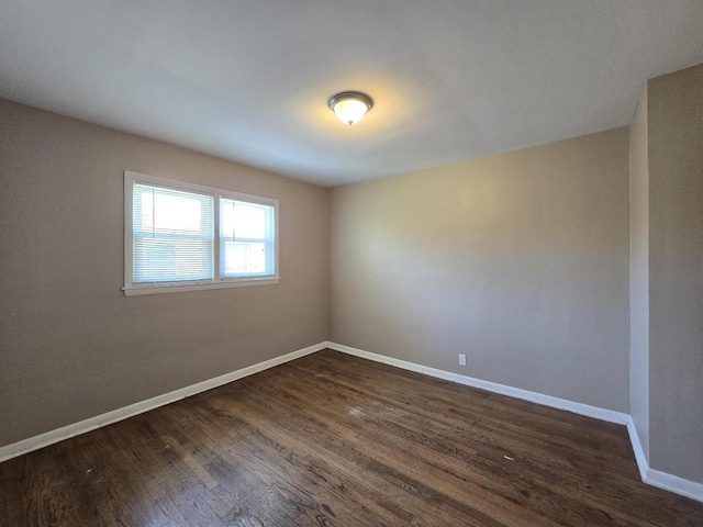 6321 W Keefe Avenue Parkway Unit 6323, Milwaukee, WI 53216 - empty room featuring dark wood finished floors and baseboards