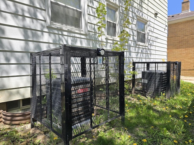 6321 W Keefe Avenue Parkway Unit 6323, Milwaukee, WI 53216 - exterior view of central air condition unit and fence
