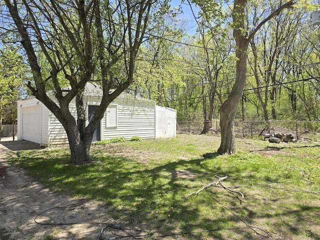 6321 W Keefe Avenue Parkway Unit 6323, Milwaukee, WI 53216 - view of yard with a garage