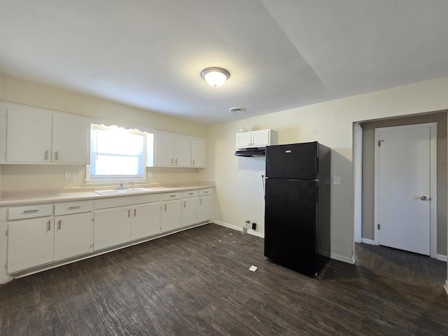 6321 W Keefe Avenue Parkway Unit 6323, Milwaukee, WI 53216 - kitchen with freestanding refrigerator, a sink, white cabinetry, dark wood-style flooring, and baseboards