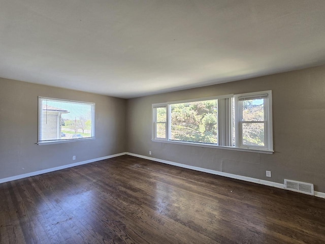 6321 W Keefe Avenue Parkway Unit 6323, Milwaukee, WI 53216 - unfurnished room with dark wood-type flooring and baseboards