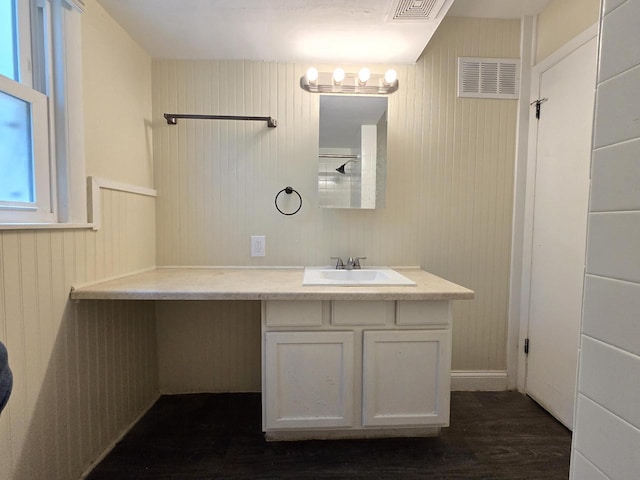 6321 W Keefe Avenue Parkway Unit 6323, Milwaukee, WI 53216 - bathroom featuring wood finished floors and vanity