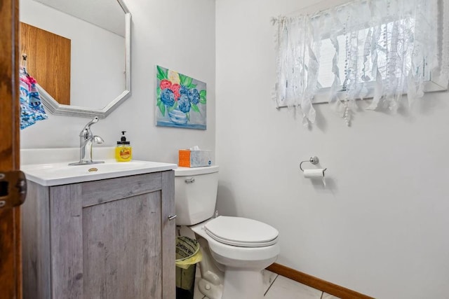 111 Rolphs Point Dr, Shell Lake, WI 54871 - half bathroom featuring toilet, vanity, baseboards, and tile patterned floors