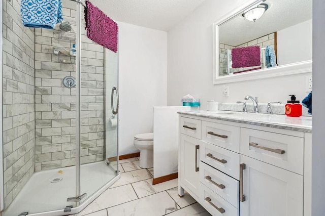111 Rolphs Point Dr, Shell Lake, WI 54871 - bathroom featuring a shower stall, marble finish floors, vanity, and toilet