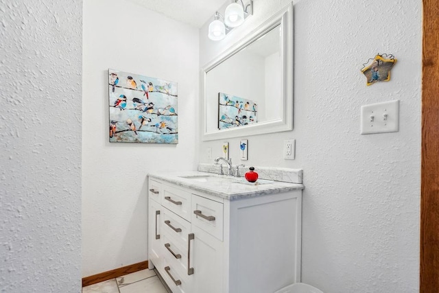 111 Rolphs Point Dr, Shell Lake, WI 54871 - bathroom featuring vanity, tile patterned flooring, and a textured wall
