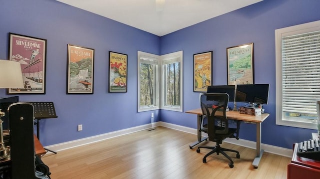 12384 98th St, Chippewa Falls, WI 54729 - office space featuring wood finished floors and baseboards
