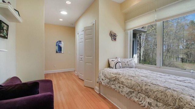 12384 98th St, Chippewa Falls, WI 54729 - bedroom with light wood-style flooring, baseboards, and recessed lighting