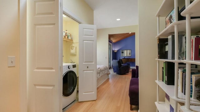 12384 98th St, Chippewa Falls, WI 54729 - clothes washing area with washer / clothes dryer, light wood-type flooring, and recessed lighting
