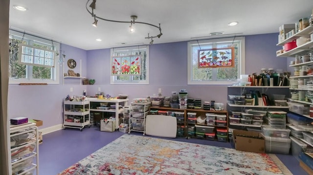 12384 98th St, Chippewa Falls, WI 54729 - playroom with finished concrete flooring, recessed lighting, and baseboards