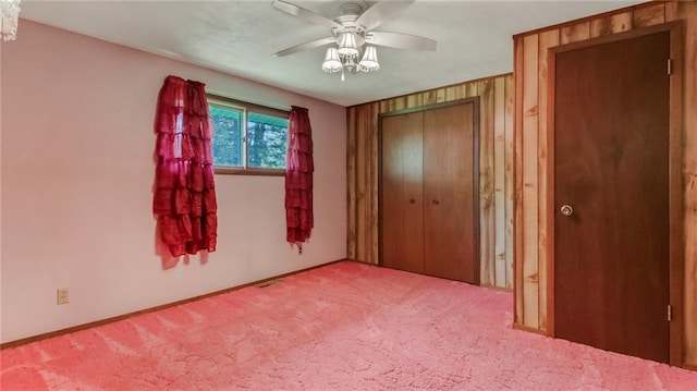 9027 W County Road D, Holcombe, WI 54745 - unfurnished bedroom featuring light colored carpet, a closet, and a ceiling fan
