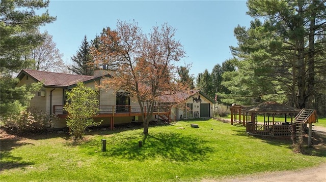 9027 W County Road D, Holcombe, WI 54745 - view of grassy yard featuring a gazebo and a deck