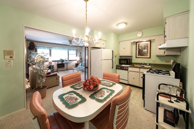 205 Country Club Dr Unit 3D, Lake Geneva, WI 53147 - dining area featuring a chandelier
