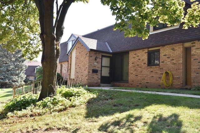 8657 N 73rd St, Milwaukee, WI 53223 - tudor house with brick siding and a shingled roof