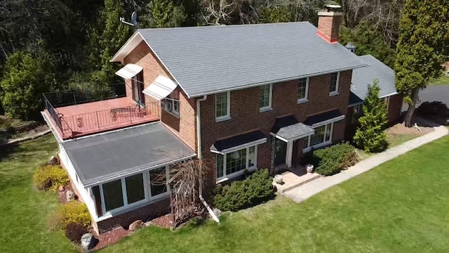 4151 Elmwood Rd, Colgate, WI 53017 - rear view of house featuring a chimney and a yard