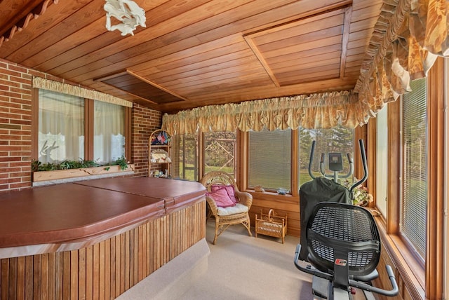 4151 Elmwood Rd, Colgate, WI 53017 - office area featuring wooden ceiling, carpet, healthy amount of natural light, and brick wall