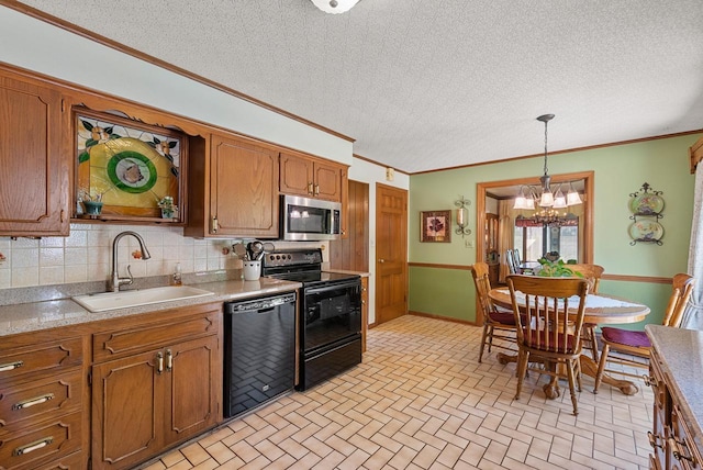 4151 Elmwood Rd, Colgate, WI 53017 - kitchen featuring black appliances, a sink, a chandelier, brick patterned flooring, and brown cabinetry