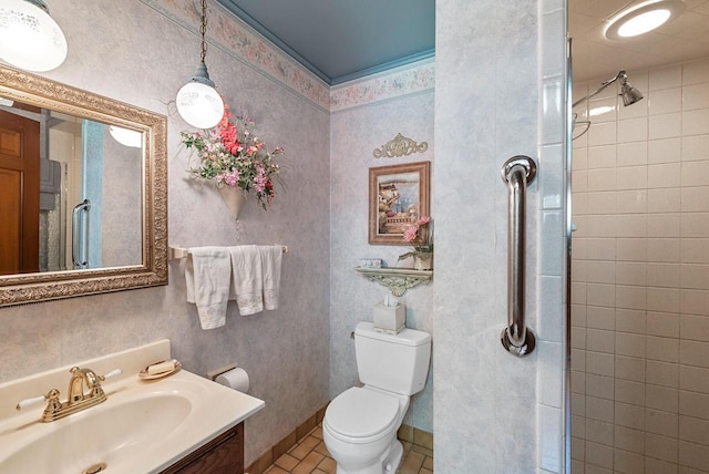 4151 Elmwood Rd, Colgate, WI 53017 - bathroom with toilet, a tile shower, vanity, and tile patterned flooring