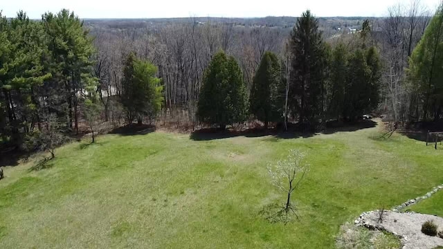 4151 Elmwood Rd, Colgate, WI 53017 - view of green lawn featuring a view of trees