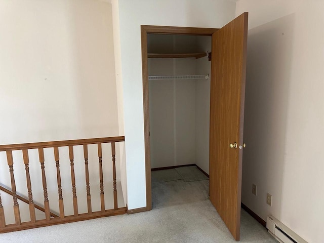 closet featuring baseboard heating