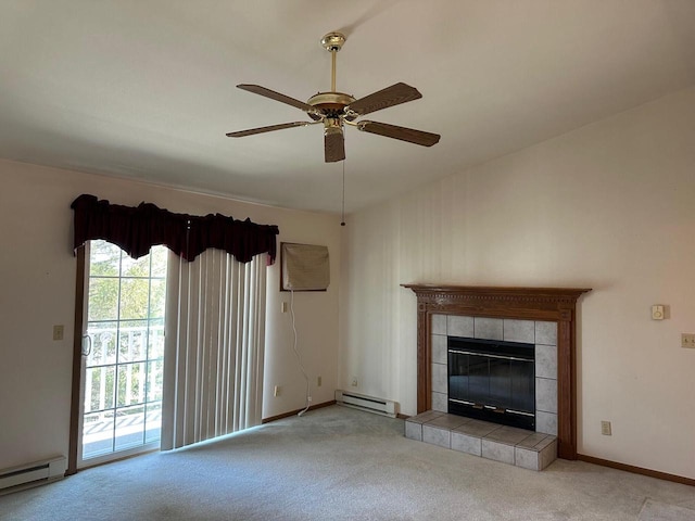 unfurnished living room with a baseboard heating unit, carpet flooring, ceiling fan, and a tile fireplace