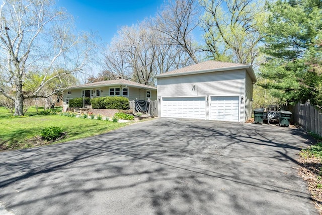 552 11th St, Kenosha, WI 53140 - view of front of house with driveway and a garage