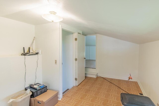 552 11th St, Kenosha, WI 53140 - hall featuring vaulted ceiling and baseboards