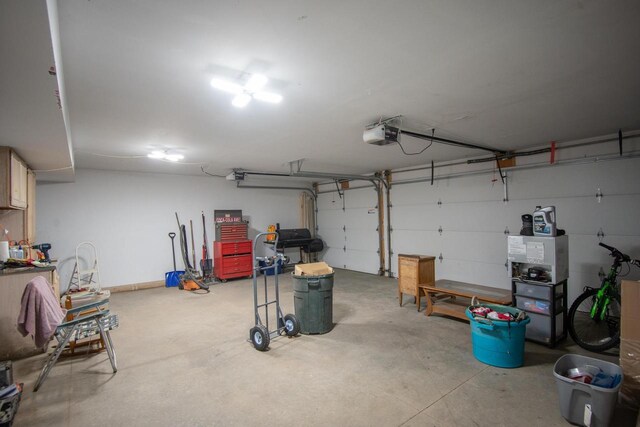 552 11th St, Kenosha, WI 53140 - garage featuring a garage door opener