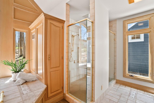 889 Horns Corners Rd, Cedarburg, WI 53012 - bathroom with a stall shower and baseboards