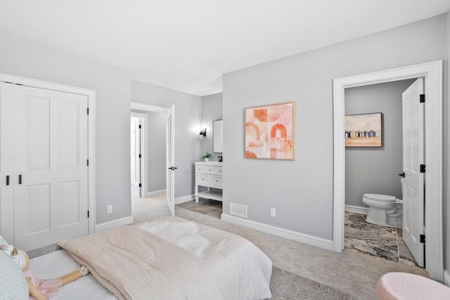 889 Horns Corners Rd, Cedarburg, WI 53012 - carpeted bedroom featuring baseboards, connected bathroom, and a closet