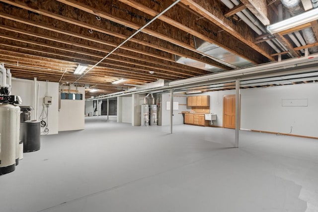 889 Horns Corners Rd, Cedarburg, WI 53012 - unfinished below grade area featuring a water softener and water heater