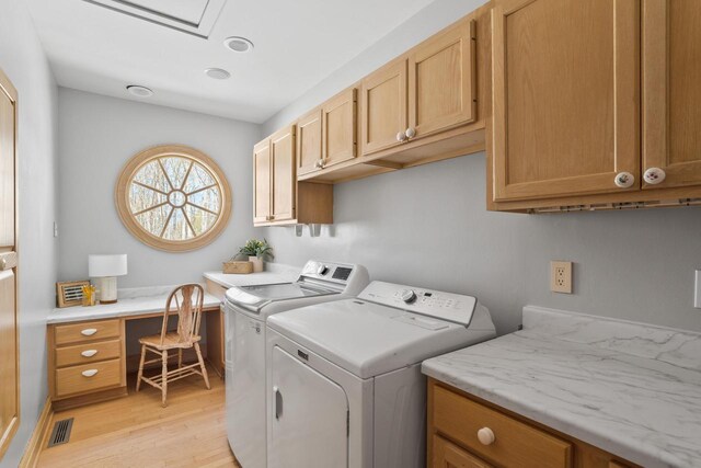 889 Horns Corners Rd, Cedarburg, WI 53012 - laundry room featuring washer and dryer, cabinet space, light wood-style flooring, an office area, and baseboards