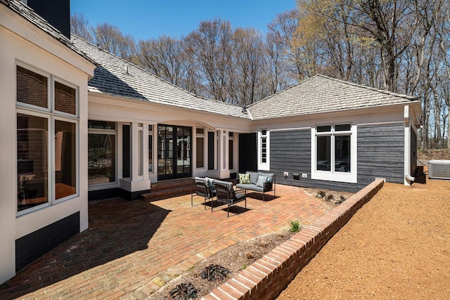 889 Horns Corners Rd, Cedarburg, WI 53012 - view of patio / terrace featuring an outdoor hangout area, central AC unit, and french doors