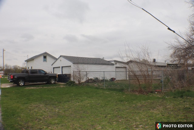 221 Center Ave, Janesville, WI 53548 - view of yard featuring a detached garage
