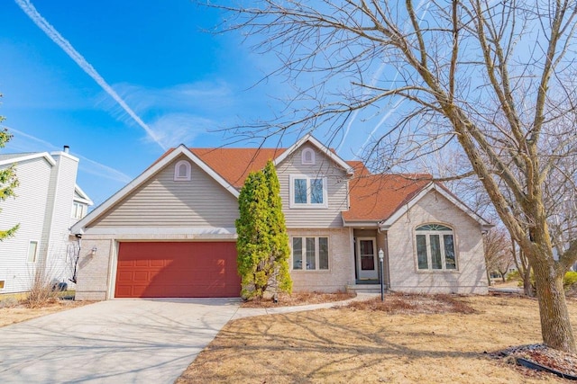 821 Ondossagon Way, Madison, WI 53719 - traditional home featuring a garage, brick siding, and driveway