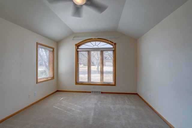 821 Ondossagon Way, Madison, WI 53719 - carpeted spare room with a ceiling fan, baseboards, and vaulted ceiling