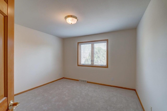 821 Ondossagon Way, Madison, WI 53719 - empty room with light carpet and baseboards