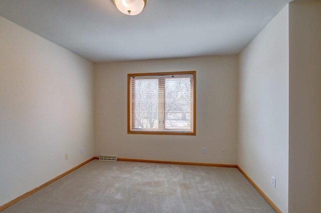 821 Ondossagon Way, Madison, WI 53719 - spare room featuring light carpet and baseboards