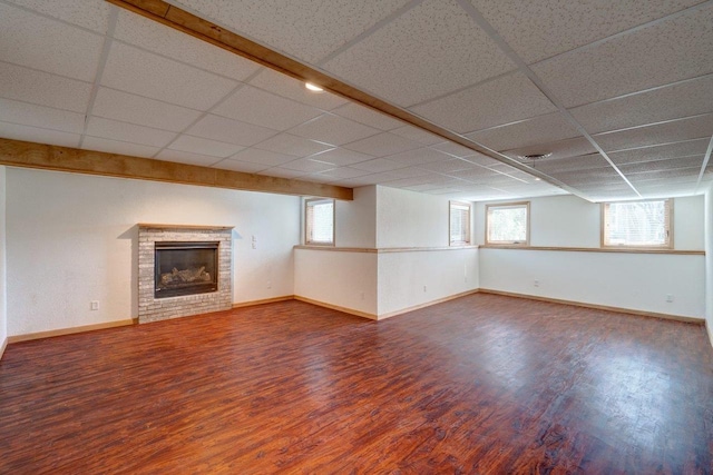 821 Ondossagon Way, Madison, WI 53719 - basement with wood finished floors, baseboards, plenty of natural light, and a drop ceiling