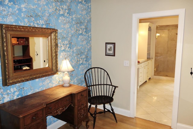 N3684 Petrie Rd, Lake Geneva, WI 53147 - hallway with wallpapered walls, baseboards, and light wood-type flooring