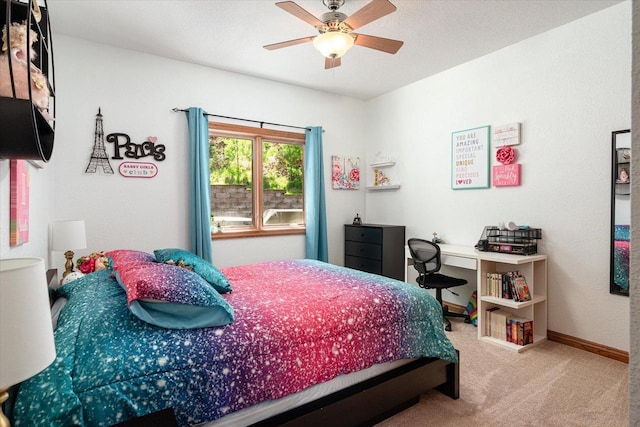 403 14th St, North Street, La Crescent, MN 55947 - bedroom with carpet floors, baseboards, and ceiling fan