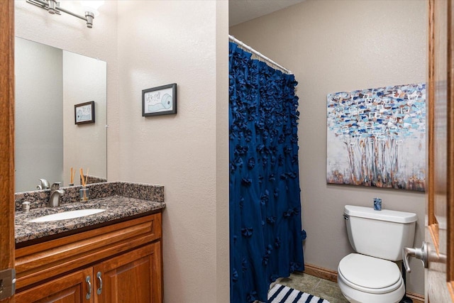 403 14th St, North Street, La Crescent, MN 55947 - full bathroom featuring toilet, vanity, a shower with shower curtain, and tile patterned flooring