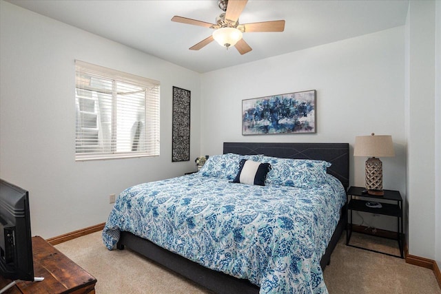 403 14th St, North Street, La Crescent, MN 55947 - carpeted bedroom with baseboards and ceiling fan