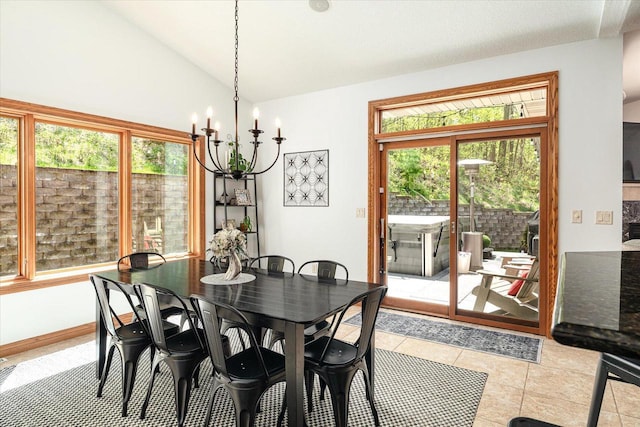 403 14th St, North Street, La Crescent, MN 55947 - dining area featuring a chandelier, vaulted ceiling, and light tile patterned floors