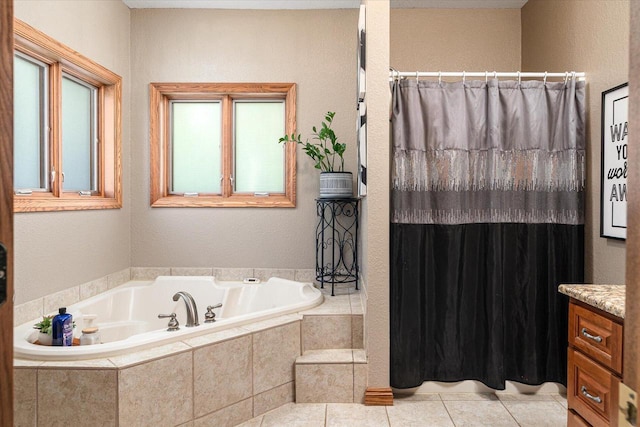 403 14th St, North Street, La Crescent, MN 55947 - full bathroom with a garden tub, curtained shower, tile patterned floors, and a textured wall