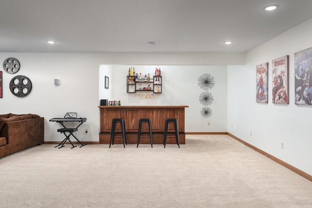 403 14th St, North Street, La Crescent, MN 55947 - indoor dry bar with light colored carpet, recessed lighting, and baseboards