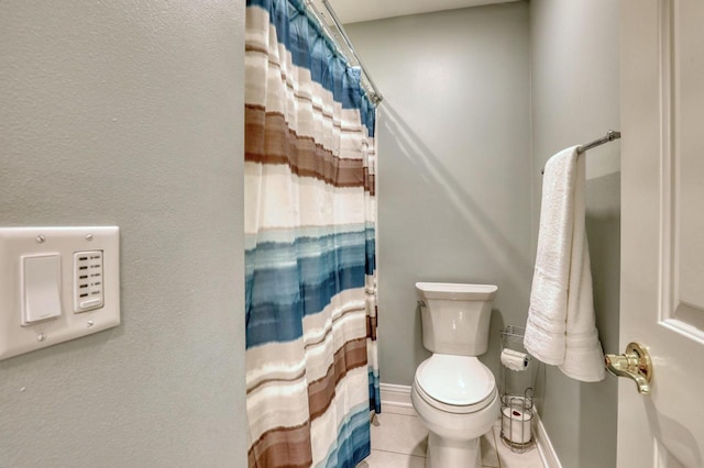 W280N7123 Millpond Way, Hartland, WI 53029 - bathroom with tile patterned flooring, baseboards, toilet, and a shower with curtain