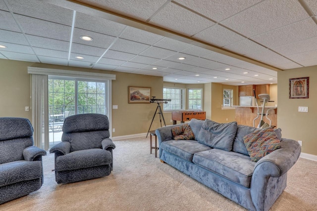 W280N7123 Millpond Way, Hartland, WI 53029 - living area with light colored carpet, baseboards, a drop ceiling, and recessed lighting