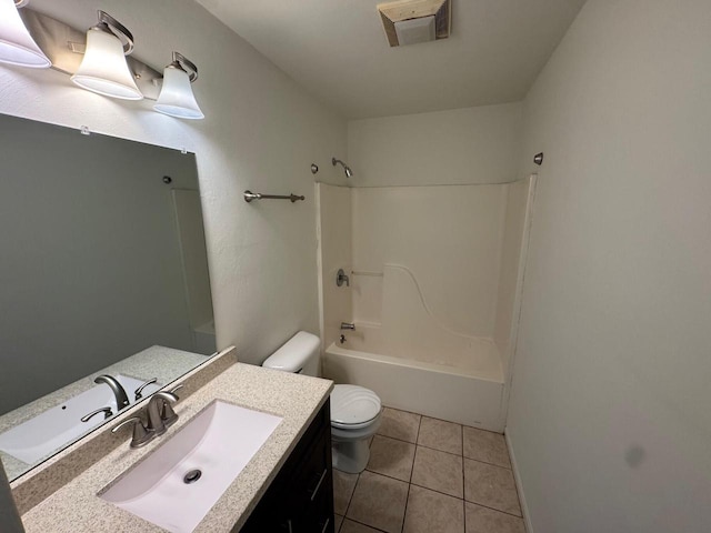 4814 Freese Ln, Madison, WI 53718 - bathroom featuring toilet, tile patterned flooring, vanity, and bathtub / shower combination