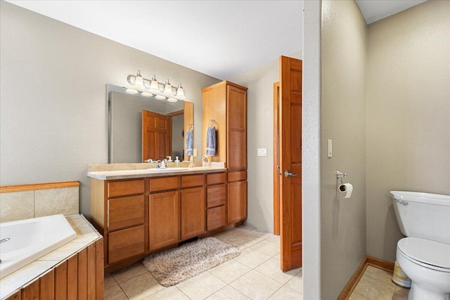 2583 Countryside Ln, Richfield, WI 53076 - bathroom featuring toilet, vanity, a bath, and tile patterned flooring